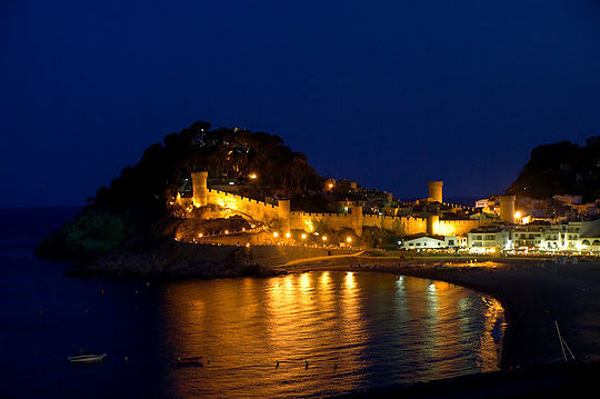 Illuminated city walls of Tossa de mar.