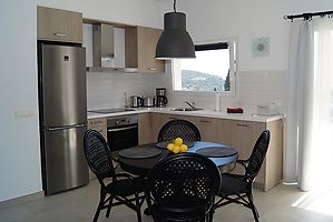 New holiday house with sunny terrace for rent in Cala Canyelles.