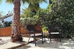 New holiday house with sunny terrace for rent in Cala Canyelles.