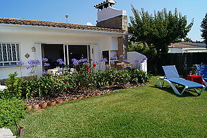 Nice house with garden and seaviews for rent in Cala Canyelles.