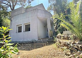 Maison avec terrain à vendre près de la plage de Cala Canyelles