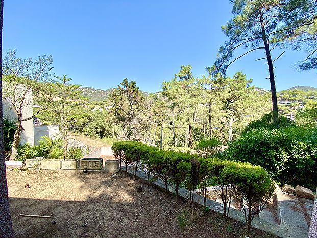 Maison avec terrain à vendre près de la plage de Cala Canyelles