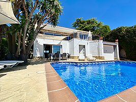 House with private pool for rent near the beach Cala Canyelles.